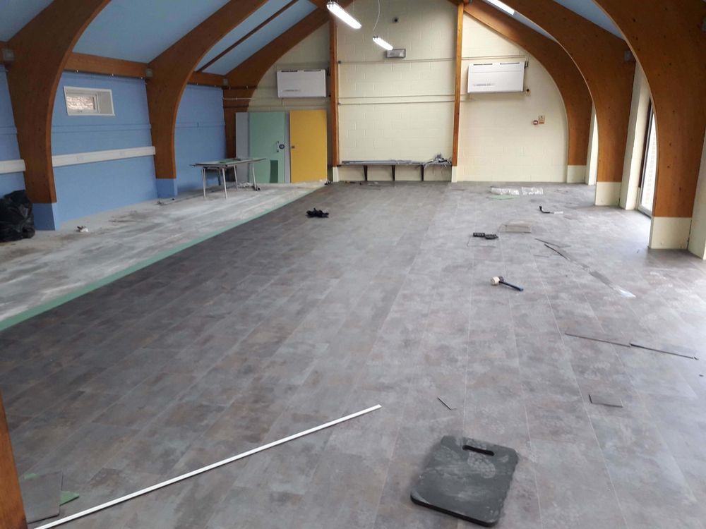 Luxury vinyl tile LVT flooring installed in a large Essex room — premium finish by local floor fitter