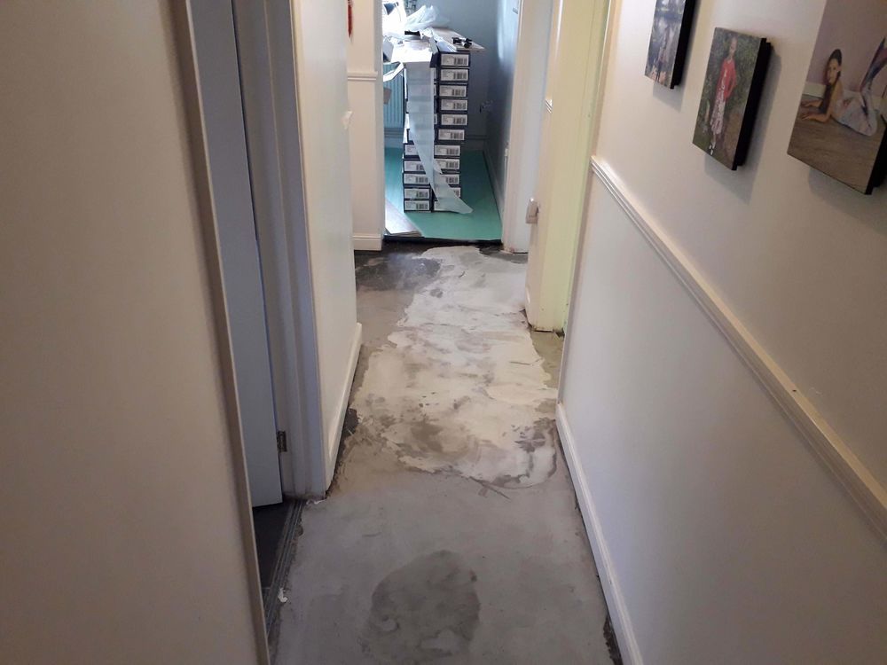 Latex screeding and floor levelling in progress on an Essex job